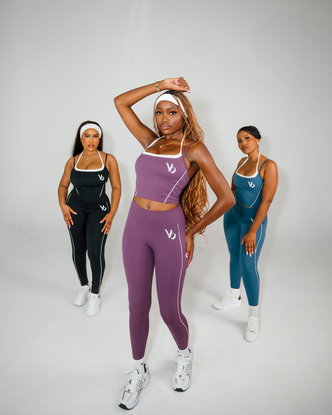three-women-in-athletic-wear-posing-1bbkoxbpzpi